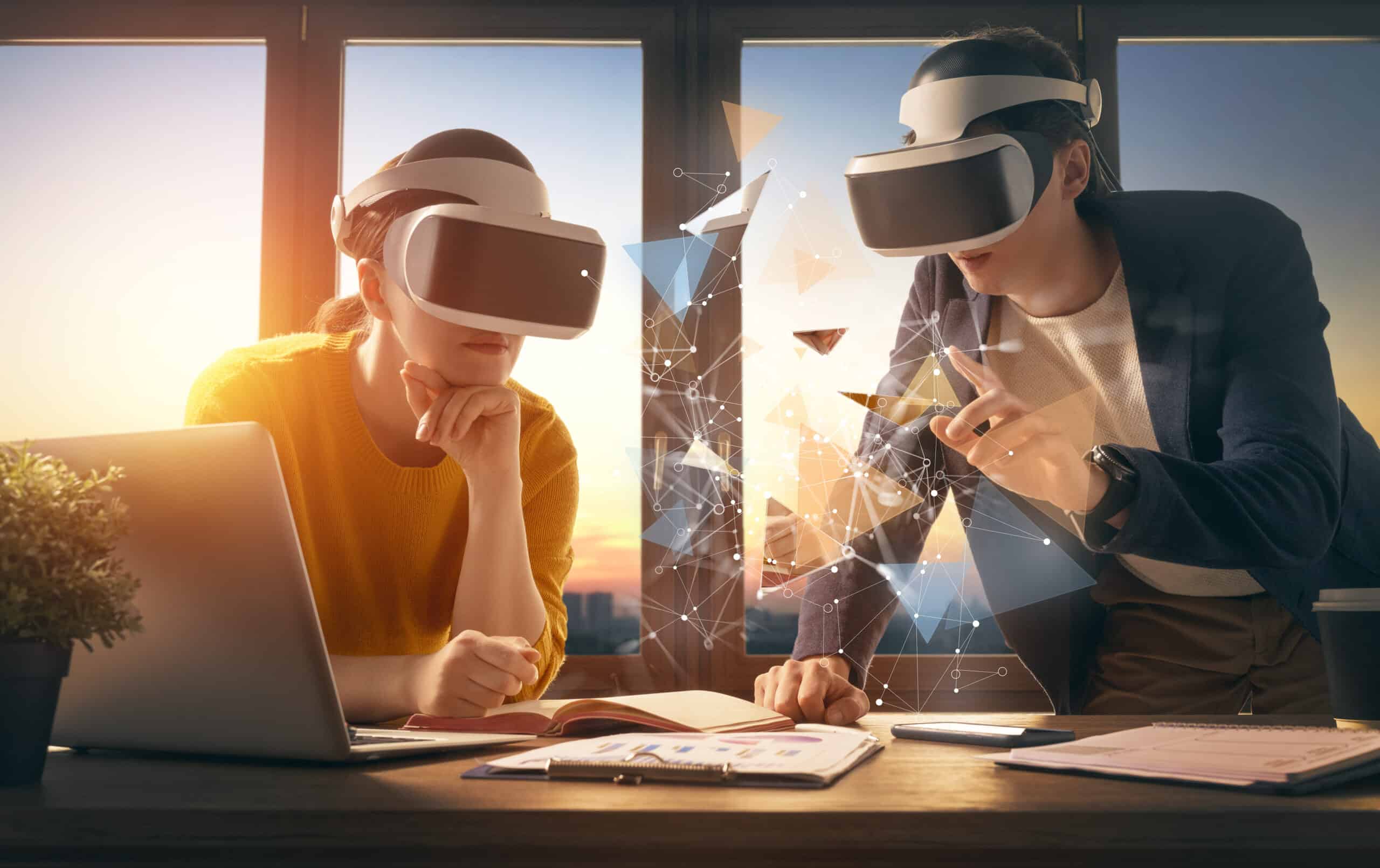  Two people with VR goggles on exploring the Metaverse