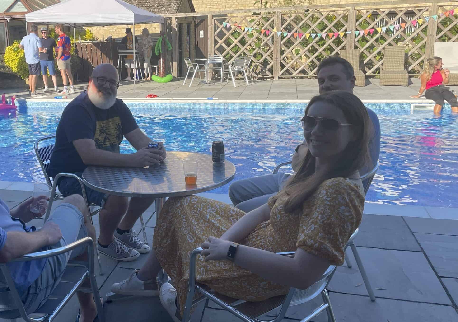  Guy, with torpedo colleagues at the pool party